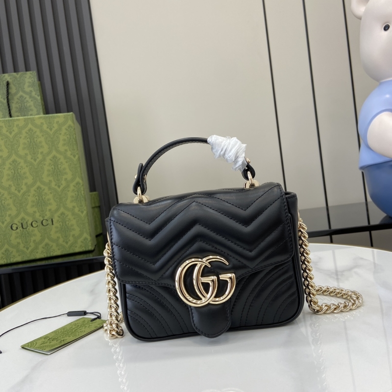 G*u*i top handle bags